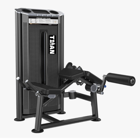 Prone Leg Curl TITAN Fitness de 95 kg para isquiotibiales acostado